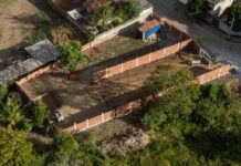 André Merlo toma área da comunidade e “empresta” para empresa; moradores criticam andré merlo toma area da comunidade e entrega para empresa privada.